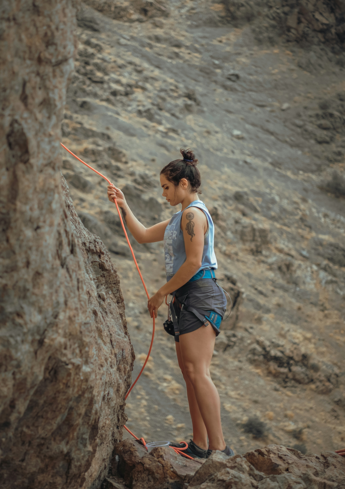 Adventurous Girl Conquering Rocky Heights: A Journey in Rock Climbing