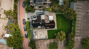 Aerial View of Suburban Living: A Blend of Residences and Parking Spaces