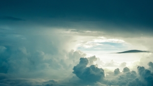 Dramatic Sky: A Dance of Clouds, Sunlight, and Atmospheric Mood