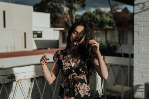 Girl Embracing Nature in Floral Top