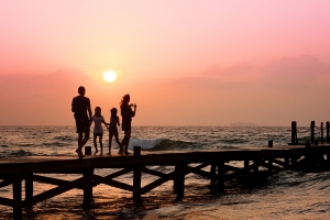 Happy Family Holiday: Sunset Moments at the Beach Pier