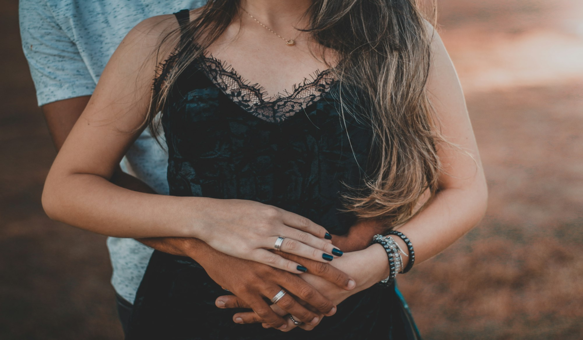 Intertwined Hands in Embrace: The Symbol of Intimacy