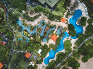 Tranquil Harmony: Aerial View of an Outdoor Pool Surrounded by Homes