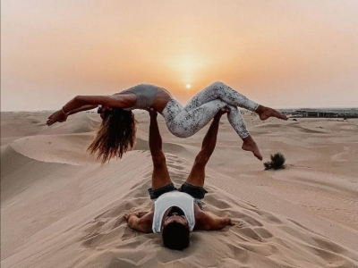 Unveiling Love through Acrobatic Discovery in a Desert Sunset