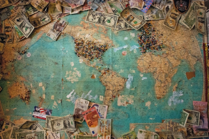 Vintage World Map Marked with Global Currencies: A Symbol of Trade and Travel